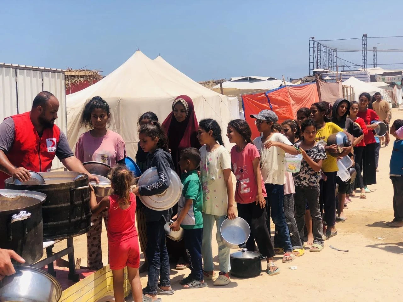 Turkish Red Crescent has established a soup kitchen in the Deir Belah region of Gaza under Israeli attack, where hot meals are distributed, Gaza, June 11, 2024. (AA Photo)