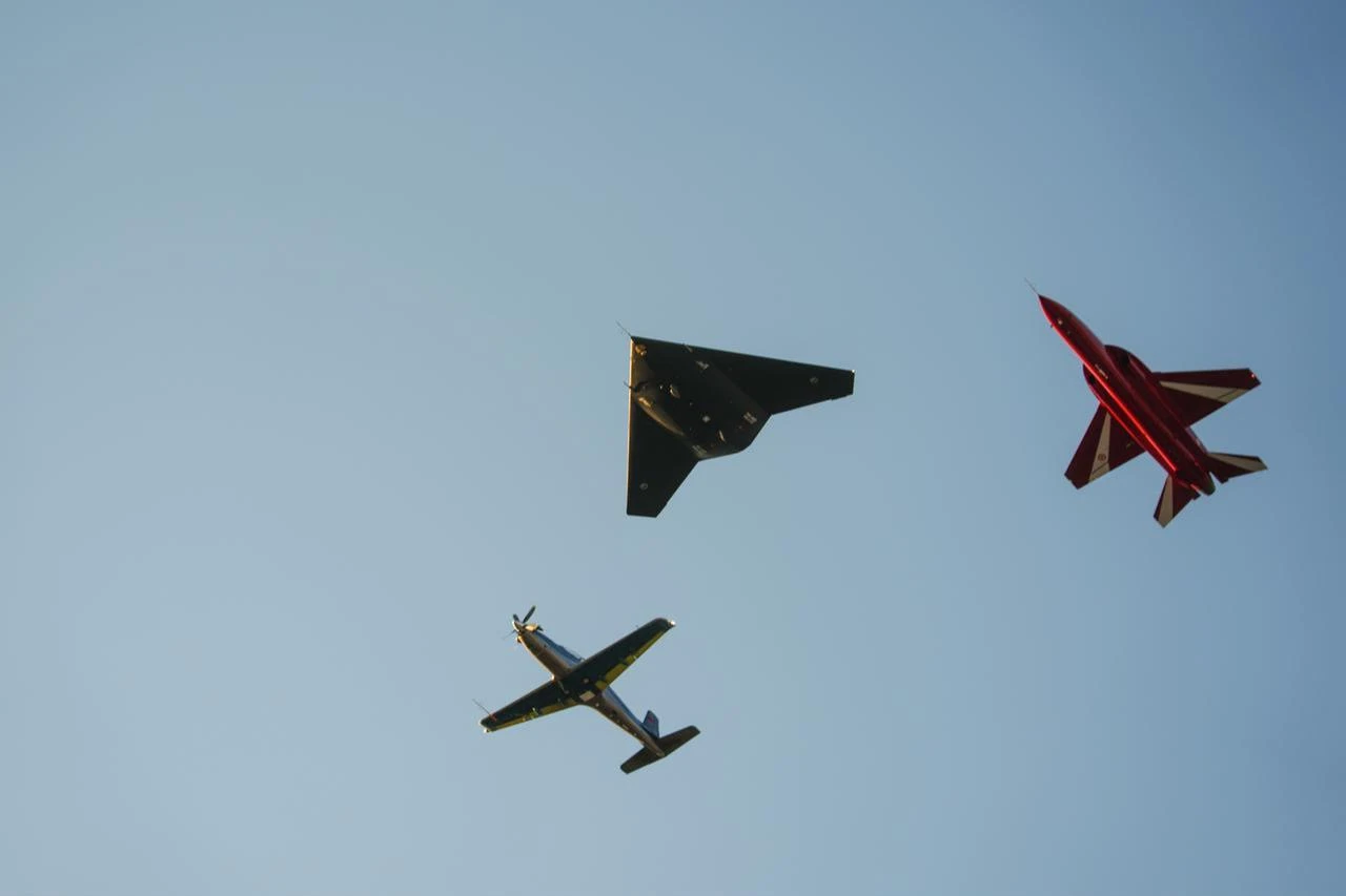 Anka III, Hurjet, and Hurkus perform a formation flight during the NATO Summit Defense Industry Forum 2026 Reception at the Turkish Aerospace Industries (TAI) in Ankara, Türkiye, July 7, 2026. (AA Photo)