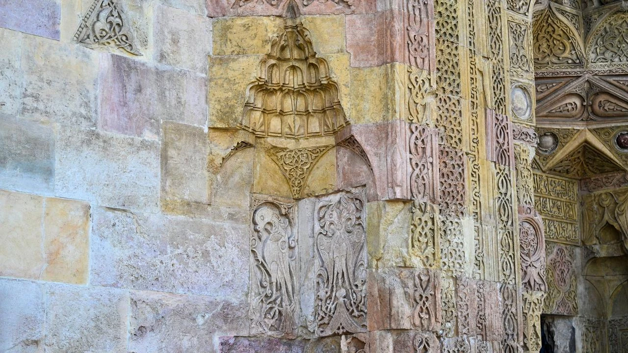UNESCO-listed Divrigi mosque reveals mysterious figures in sunlight