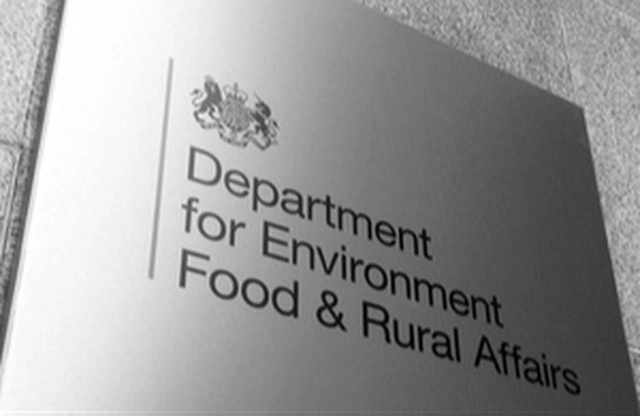A sign reading "Department for Environment, Food and Rural Affairs" is mounted on a wall. (Photo via www.gov.uk)