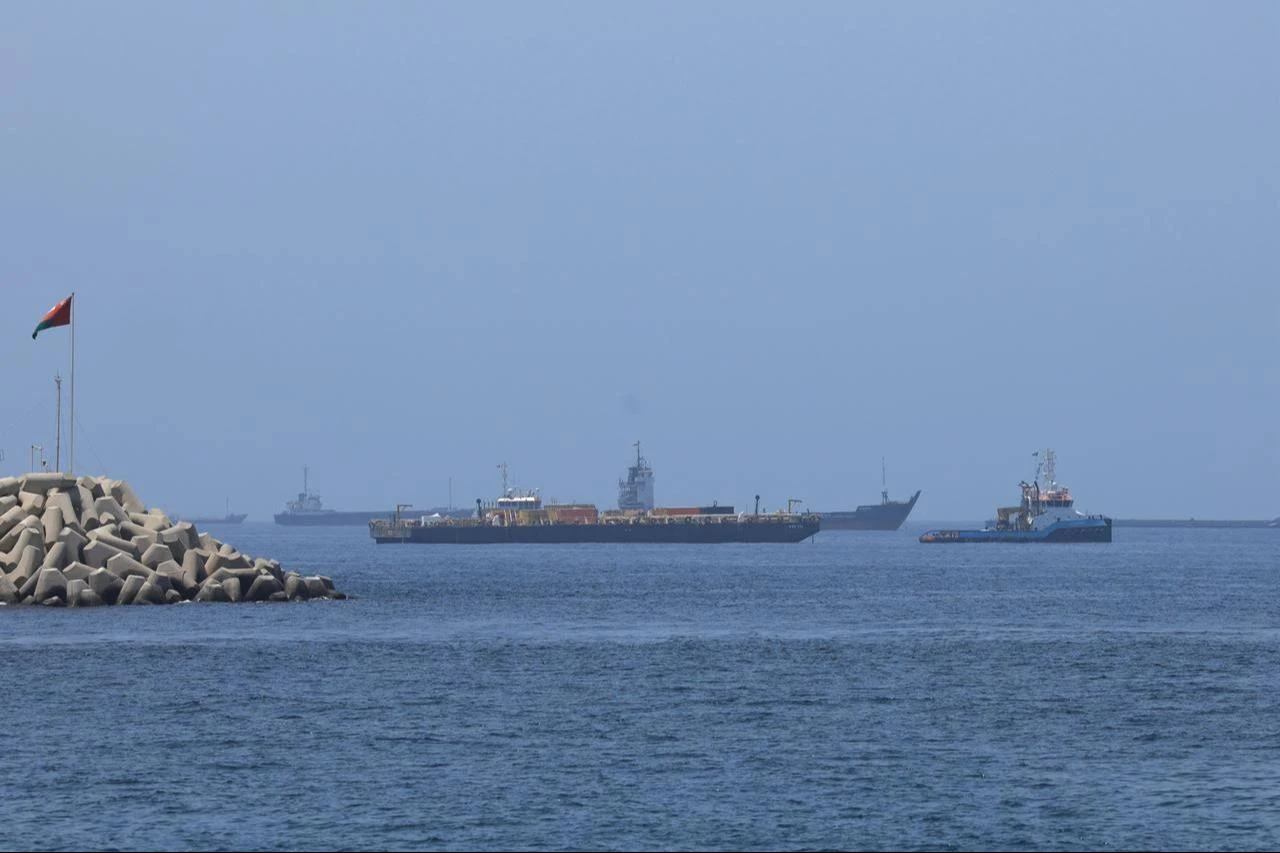 A view of commercial cargo vessels and crude oil tankers are anchored in the Gulf of Oman, off the coast of Muscat, Oman, June 21, 2026. (AA Photo)