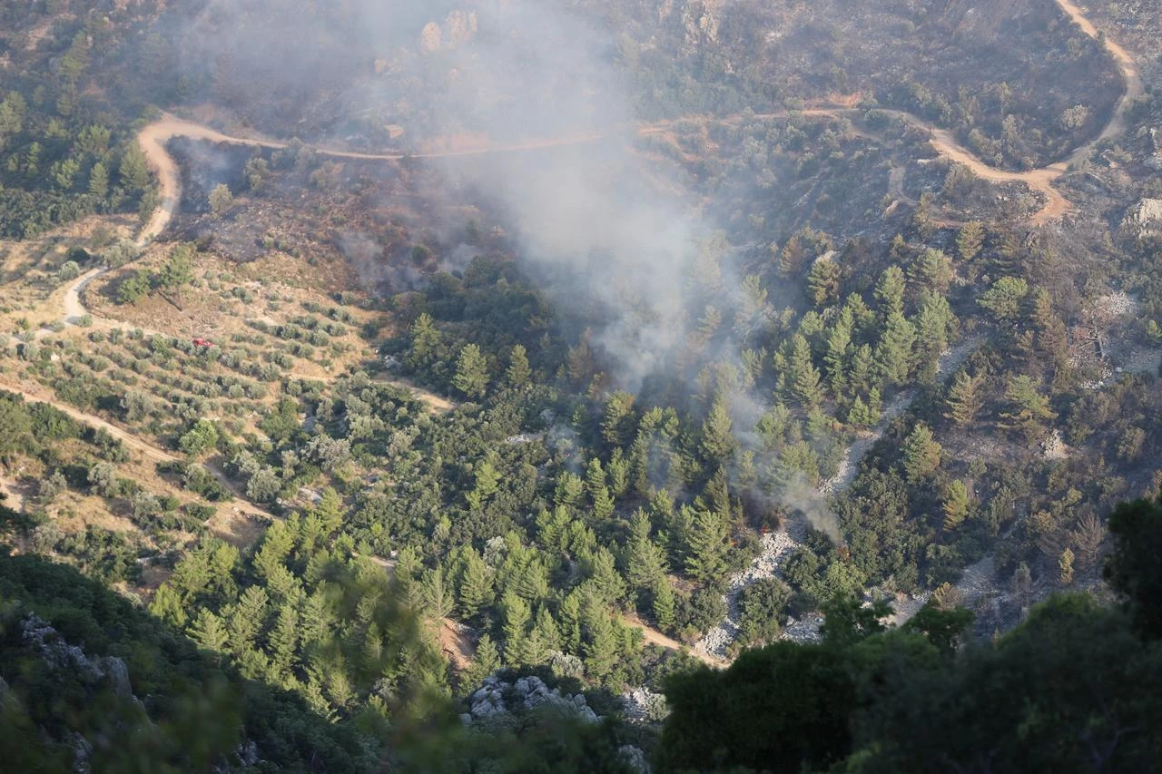 Smoke rises from a forest fire in Kas, Antalya, Türkiye, July 29, 2026. (AA Photo)