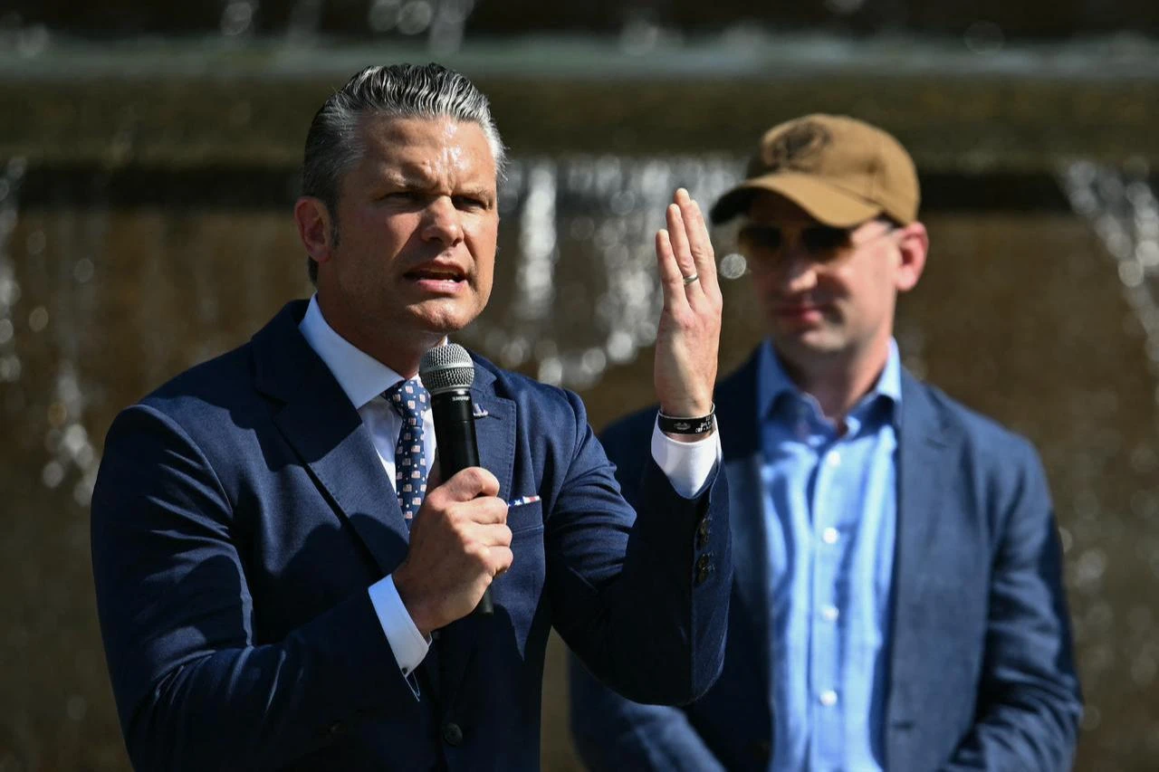 US Secretary of Defense Pete Hegseth (L) speaks alongside White House Deputy Chief of Staff Stephen Miller (R) during a “DC Safe and Beautiful Task Force” ceremony in Washington, DC, July 2, 2026. (AFP Photo)