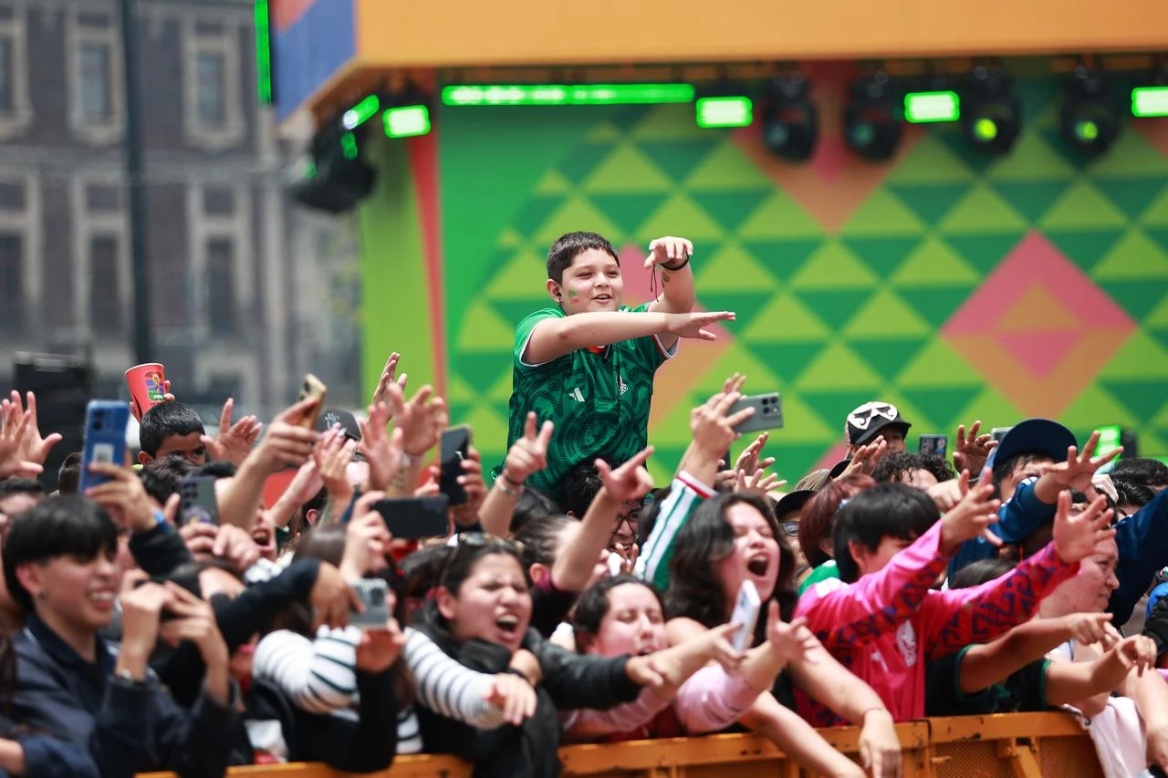 Fans react during a show by Mexico's Lucha Libre AAA Worldwide as part of the FIFA Fan Festival, at Zocalo square, in Mexico City, Mexico, July 1, 2026. (AA Photo)