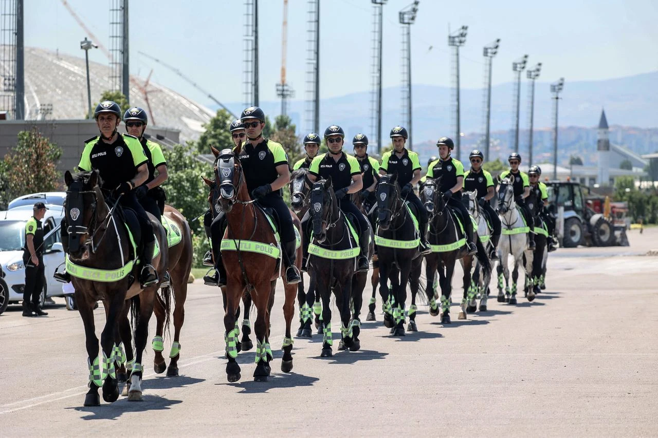 Turkish mounted police officers patrol in a park as part of NATO security preparations ahead of the summit, in Ankara on July 2, 2026. The 36th NATO summit will be held in Ankara on July 7-8, 2026. (AFP Photo)