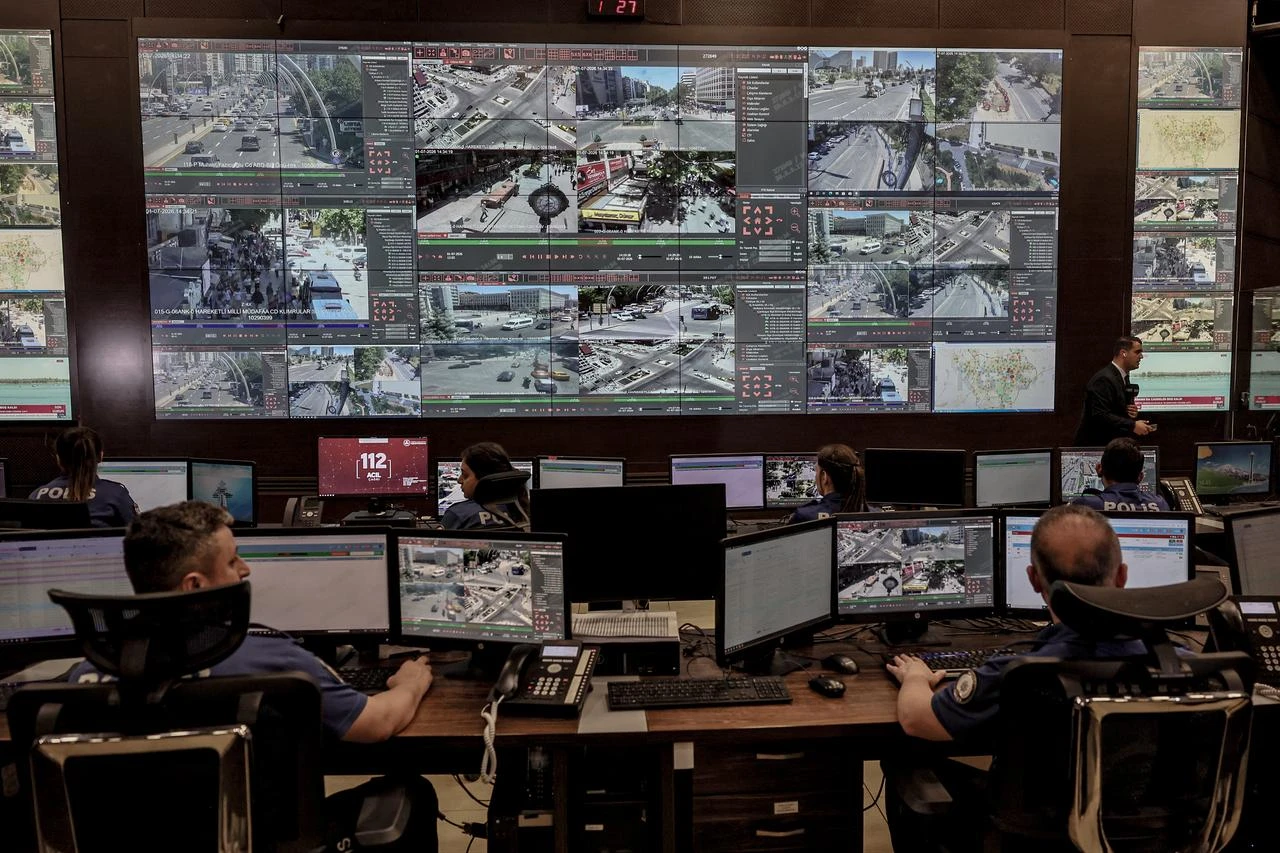 Turkish police officers watch live CCTV images of the streets of Ankara from a monitoring centre as part of NATO security preparations, in Ankara on July 1, 2026. (AFP Photo)
