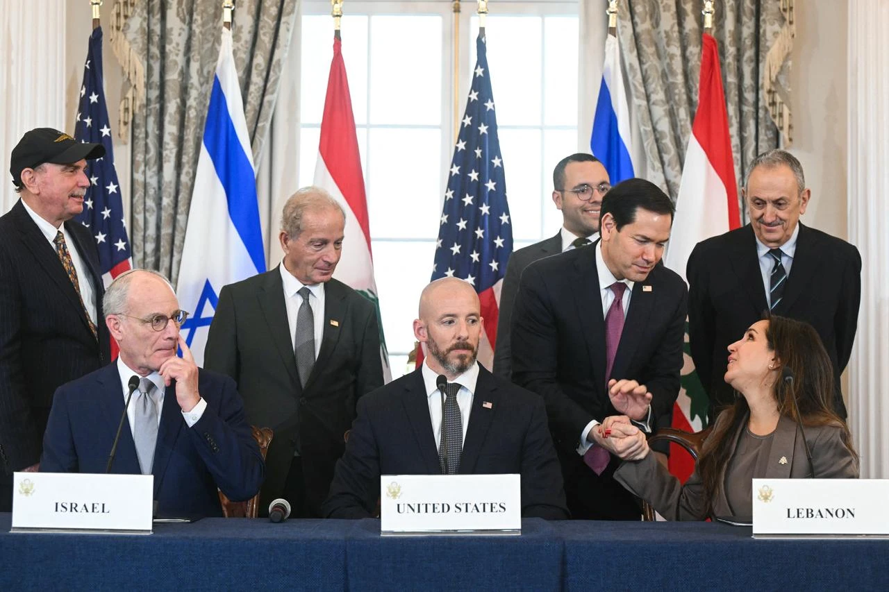US Secretary of State Marco Rubio shakes hands with Lebanese Ambassador to the US Nada Hamadeh (R, front) during a signing ceremony at the US Department of State in Washington, DC, June 26, 2026. (AFP Photo)