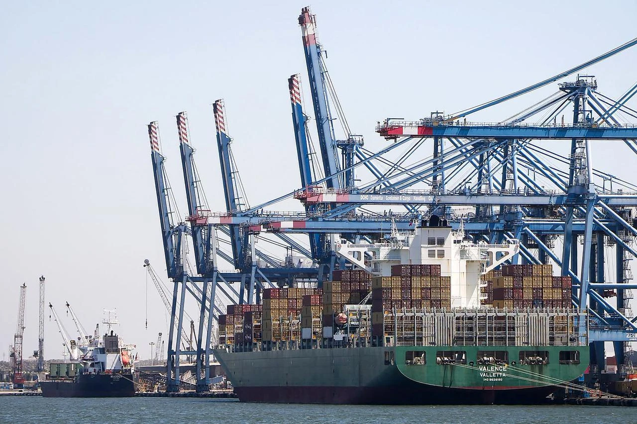 This handout photograph, taken and released on July 30, 2026, shows ships docked on the wharf of the Mediterranean seaport of Damietta. (AFP Photo/Damietta Port Authority/HO)
