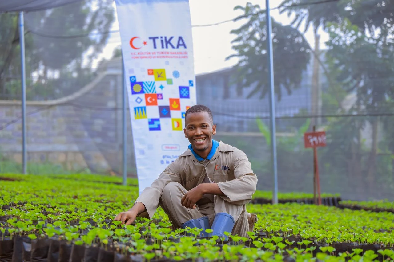 A worker poses among young seedlings at the TIKA-supported facility, which will also provide practical agricultural training and support technology transfer. (AA Photo)