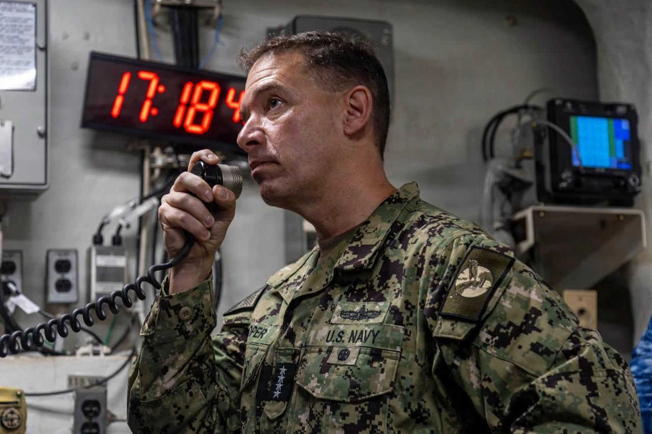 U.S. Navy Adm. Brad Cooper, commander of U.S. Central Command, makes an announcement aboard Nimitz-class aircraft carrier USS Abraham Lincoln (CVN 72) in the Arabian Sea, Feb. 7, 2026. (Photo via U.S. Navy)