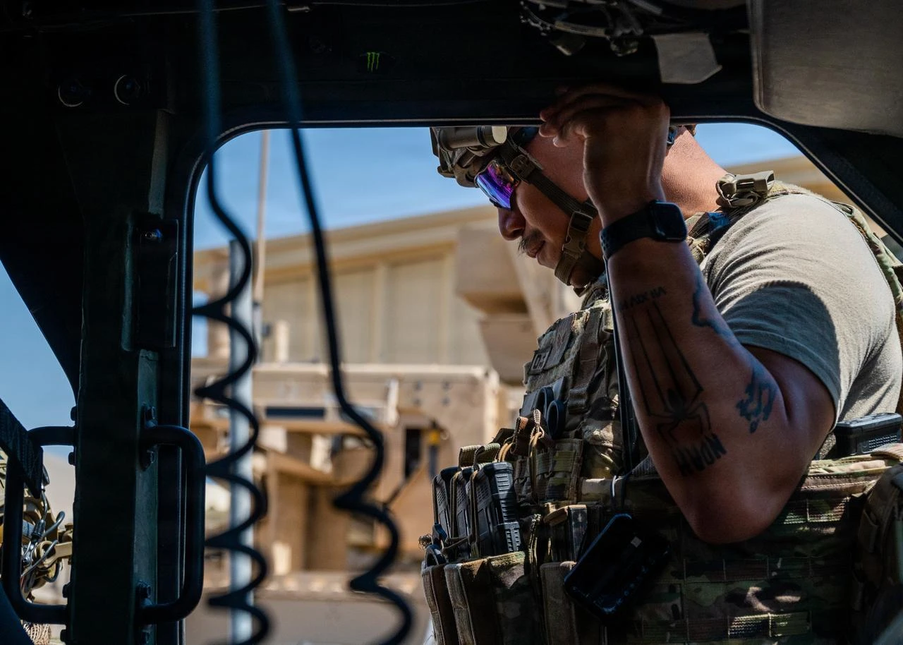 U.S. Air Force Defender enters a Joint Light Tactical Vehicle (JLTV) prior to a routine patrol at a base in the U.S. Central Command area of responsibility July 3, 2026. (Photo via U.S. Air Force)