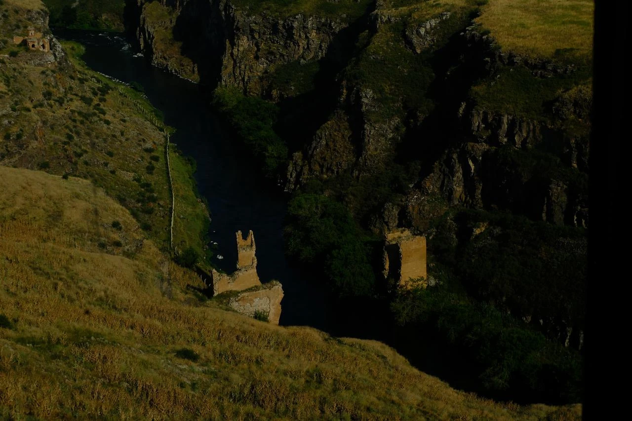 The ruined towers of the Ani bridge on the Akhuryan river, one on each bank in Kars, Türkiye July 2026. (Yagiz Efe Parmaksiz / Türkiye Today)