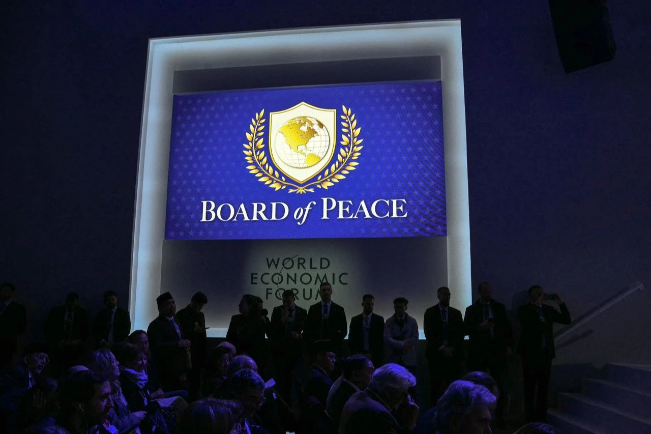This photograph shows the logo of the "Board of Peace" during the World Economic Forum (WEF) annual meeting in Davos on January 22, 2026. (AFP Photo)