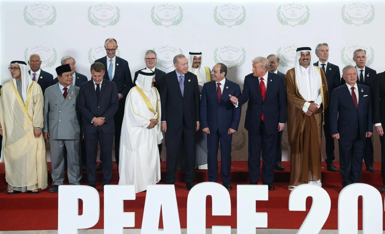 World leaders pose for a family photo ahead of the Sharm El-Sheikh Peace Summit in Sharm El-Sheikh, Egypt, on October 13, 2025. (Photo via Turkish Presidency/Mustafa Kamaci/HO)