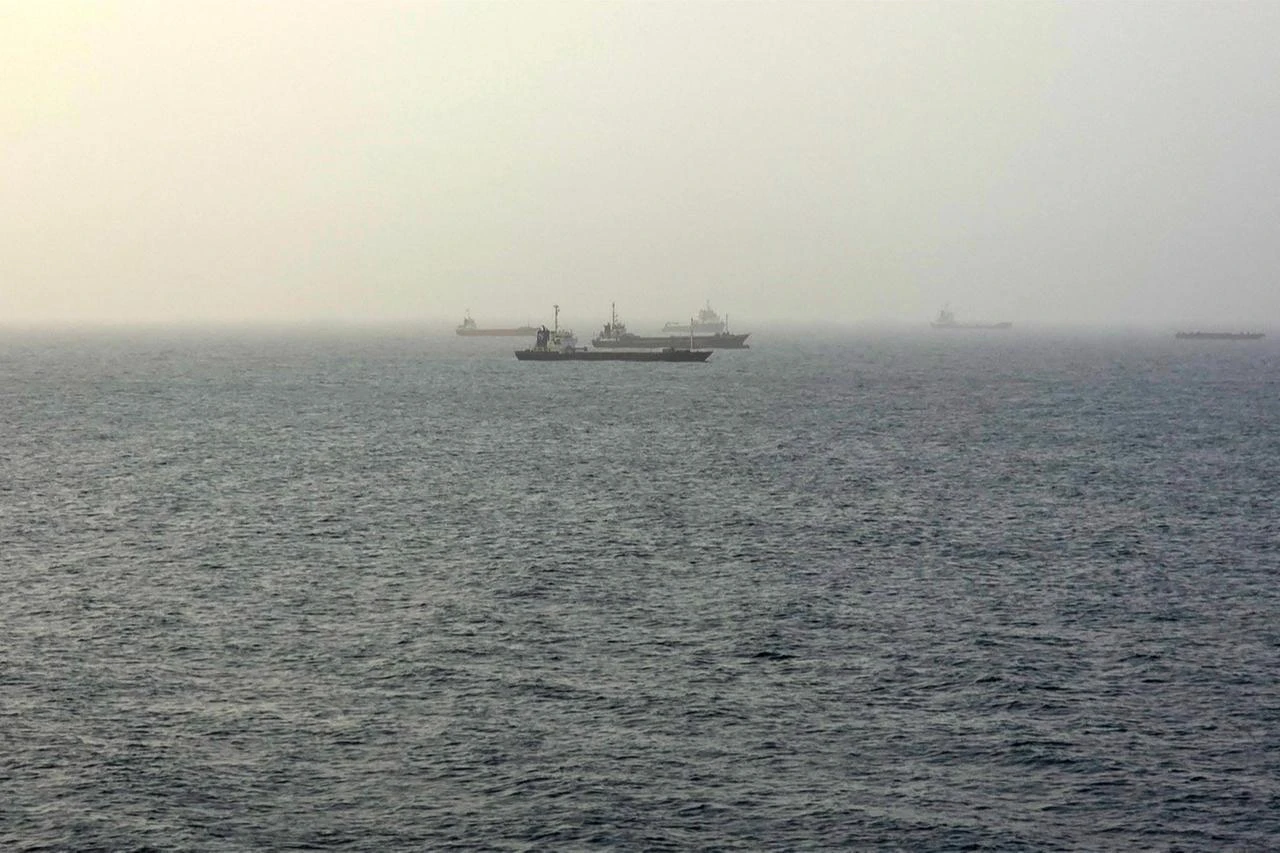 Vessels transiting through the Gulf of Oman are pictured off the coast of Muscat on July 25, 2026. (AFP Photo)