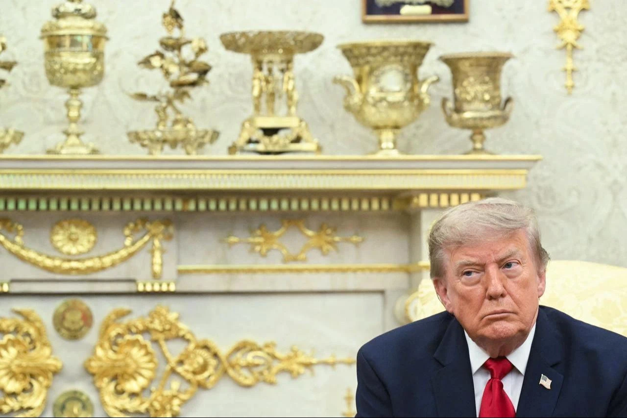 US President Donald Trump looks on during a meeting with Prime Minister of Iraq Ali al-Zaidi in the Oval Office of the White House in Washington, DC, on July 14, 2026. (AFP Photo)