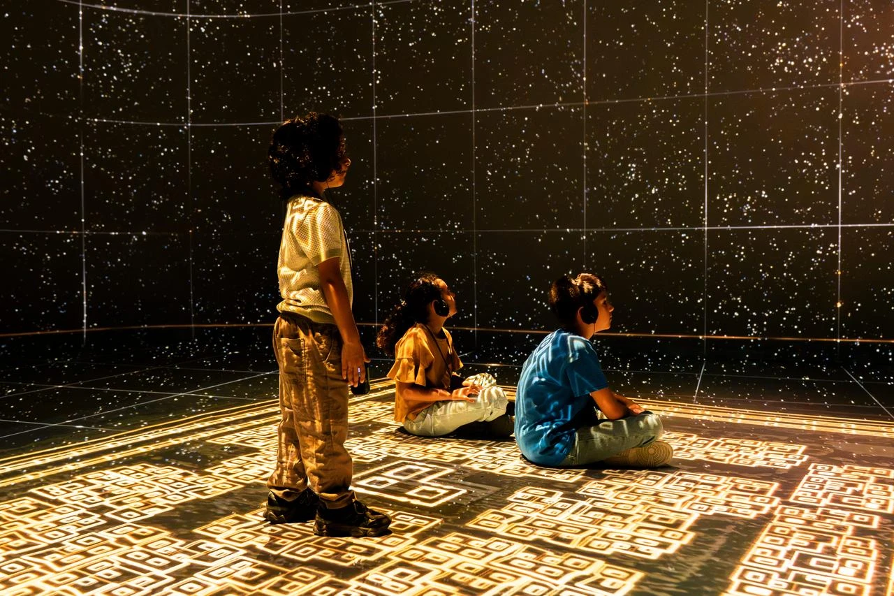 Children experience an immersive digital installation at the Göbeklitepe-inspired TimeWalk Exhibition in London, July 24, 2026. (AA Photo)