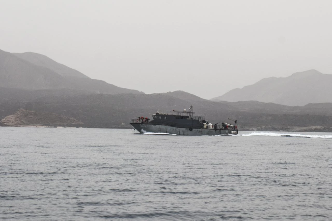 A vessel of the navy of Yemen's Aden-based internationally recognized government patrols a shipping lane off Hanish Island in the Red Sea on July 27, 2026. (AFP Photo)