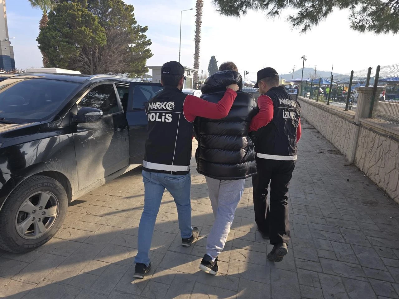 A fugitive convict wanted by the International Police Organization (Interpol) with a red bulletin for “manufacturing and trafficking of narcotic substances” was arrested in Izmir, Türkiye, 13 March 2025. (AA Photo)