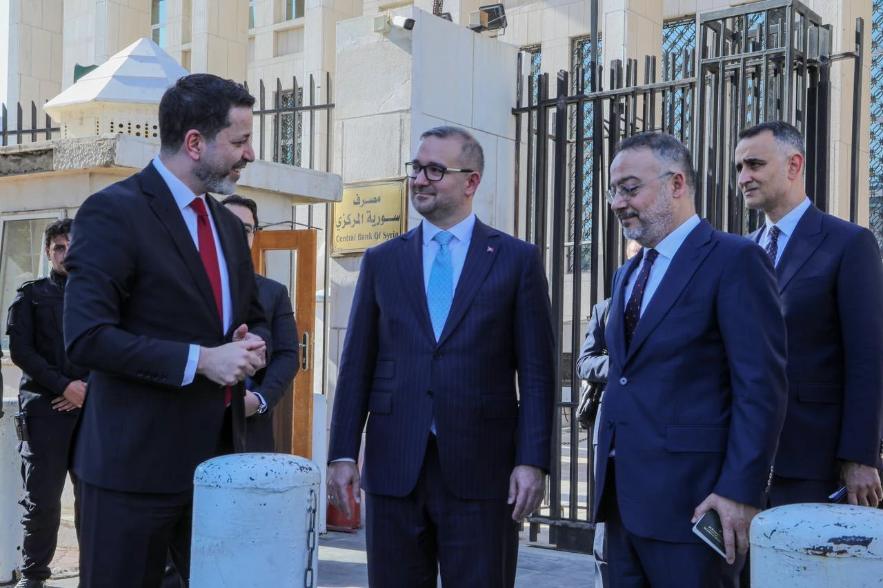 Central Bank of the Republic of Türkiye (CBRT) Governor Fatih Karahan (C) meets with Central Bank of Syria Governor Mohammad Safwat Raslan (L) during his visit to Damascus, accompanied by Türkiye's Ambassador to Syria Nuh Yılmaz (R), in Syria on July 29, 2026. (AA Photo)