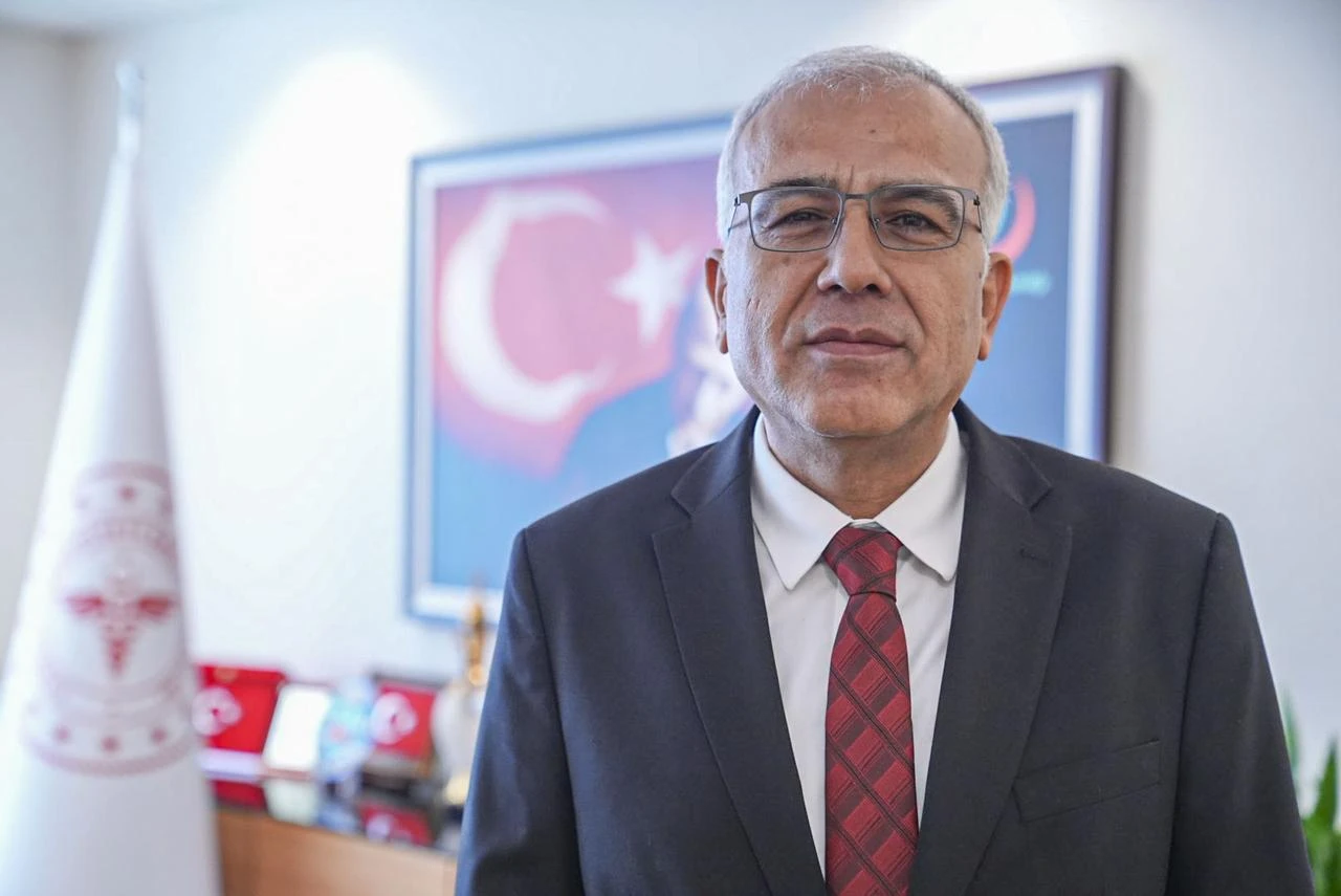 Erdoğan Öz, Director General of Public Health at the Ministry of Health poses for a photo in his office in Türkiye, July 3, 2026. (AA Photo)