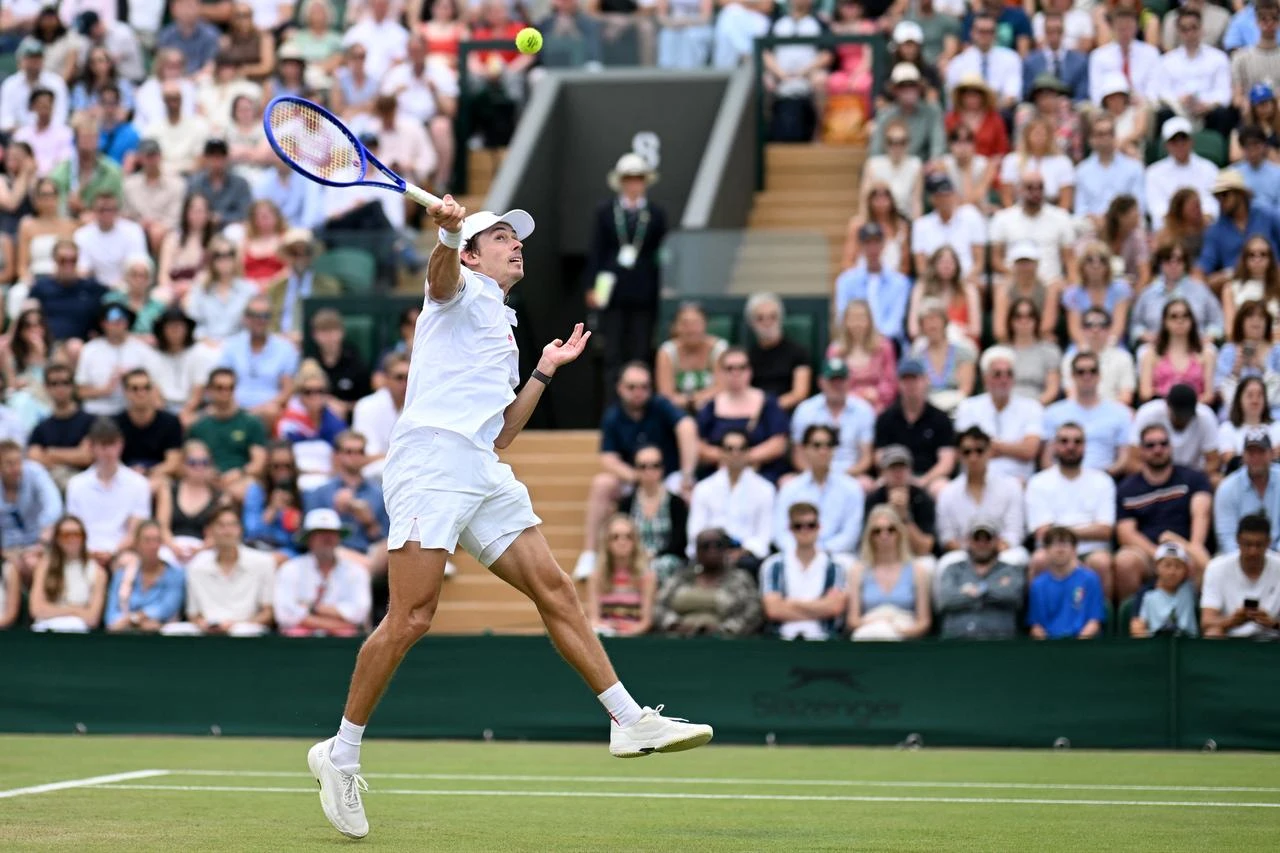 Australia's Alex De Minaur returns to US player Zachary Svajda during their men's singles third round tennis match on the sixth day of the 2026 Wimbledon Championships at The All England Lawn Tennis and Croquet Club, London, England, July 4, 2026. (AFP Photo)