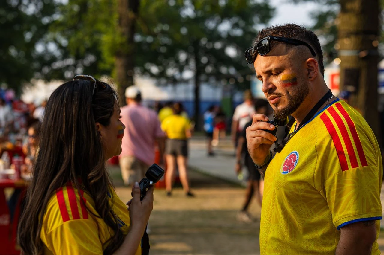 Colombia fans use small electric fans to cool off at the FIFA Fan Festival as they wait for the WC 2026 Round of 32 match between Colombia and Ghana in Missouri, US, July 3, 2026. (AFP Photo)