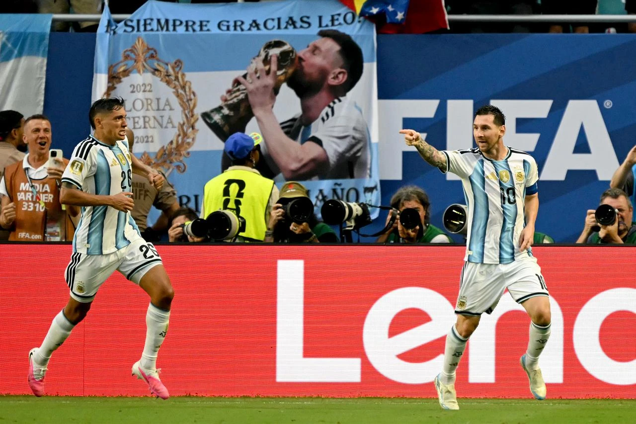 Argentina's forward #10 Lionel Messi celebrates with teammate Argentina's defender #26 Nahuel Molina scoring his team's first goal during the 2026 World Cup round of 32 football match between Argentina and Cape Verde at the Miami Stadium in Miami Gardens, July 3, 2026. (AFP Photo)