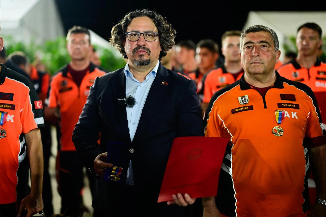 Turkish search and rescue teams pose after receiving heroism medals from Venezuela’s interim President Delcy Rodriguez in Venezuela, July 4, 2026. (AA Photo)