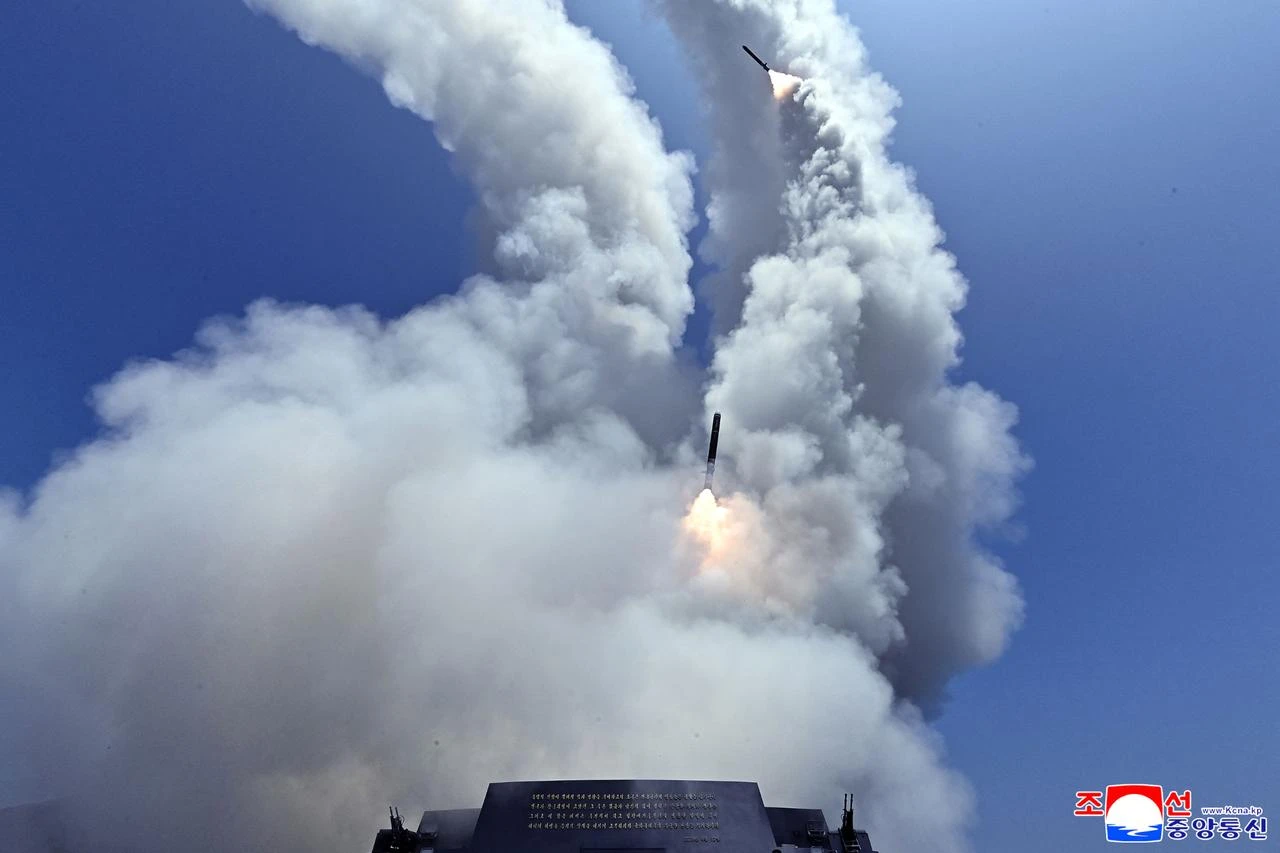 Kim Jong Un oversees naval missile test as Xi vows stable ties