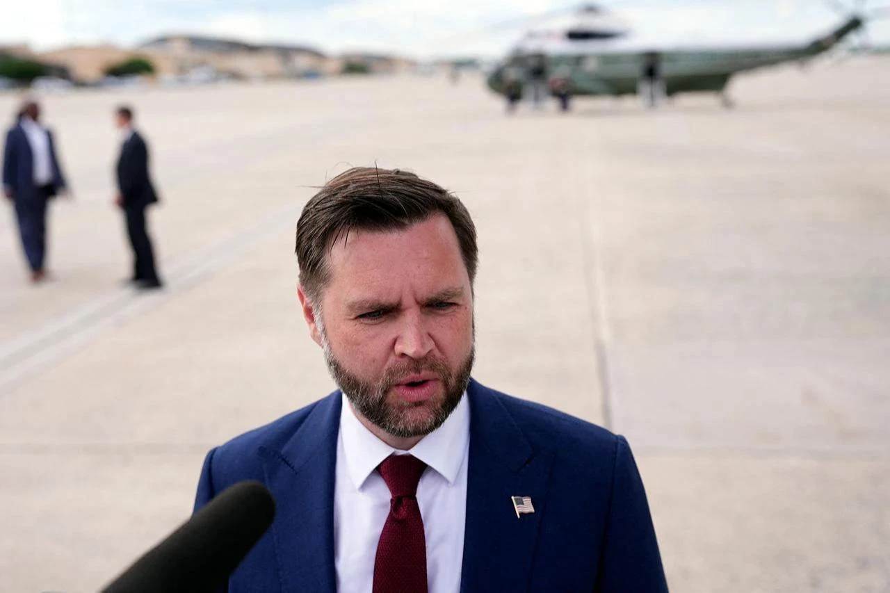 US Vice President JD Vance (R) speaks with reporters after his arrival at Joint Base Andrews in Maryland, on May 28, 2026, on his return from Colorado. (AFP Photo)