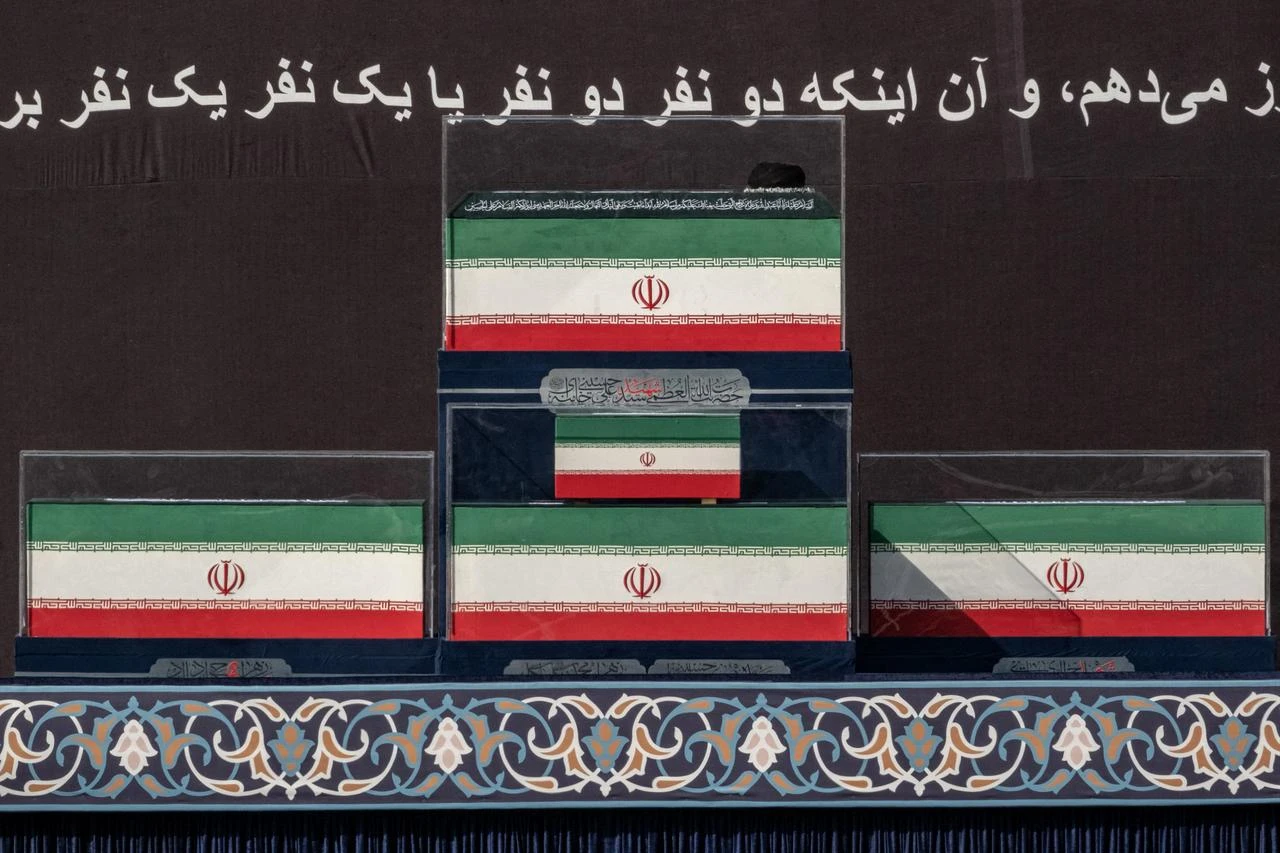The coffins of Iran's slain supreme leader Ali Khamenei and his family members are pictured at the Grand Mosalla at the start of the funeral ceremonies in Tehran, July 4, 2026. (AFP Photo)