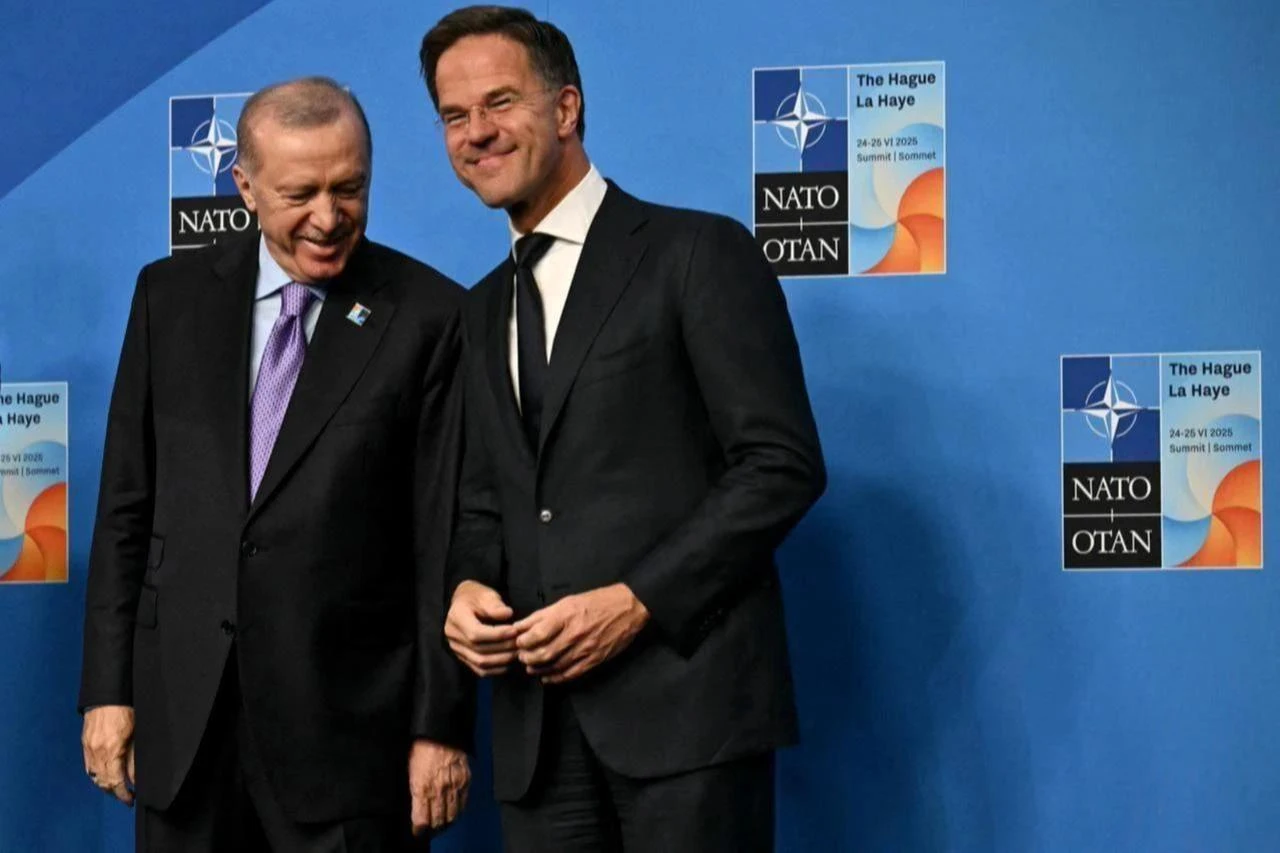 President Recep Tayyip Erdogan poses for a picture with NATO Secretary General Mark Rutte during the North Atlantic Treaty Organization (NATO) Heads of State and Government summit in The Hague, June 25, 2025. (AFP Photo)