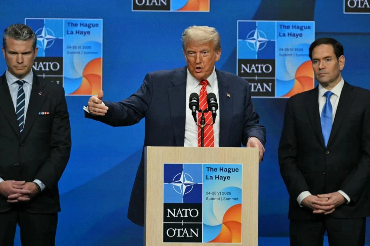 Defense Secretary Pete Hegseth (L) and Secretary of State Marco Rubio (R) listen as US President Donald Trump addresses a press conference during a NATO Heads of State and Government summit in The Hague, Netherlands, June 25, 2025. (AFP Photo)