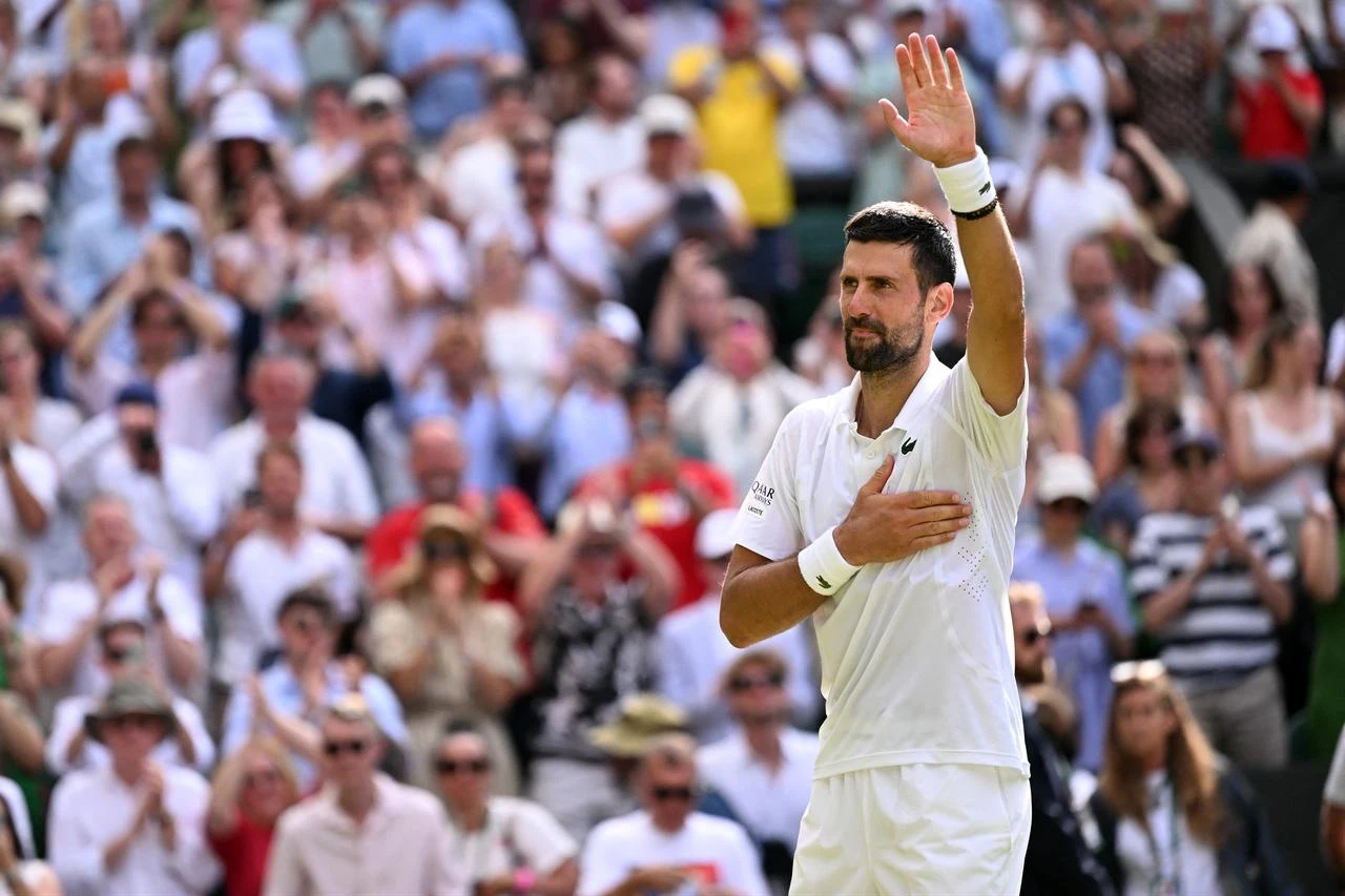 Serbia's Novak Djokovic celebrates beating Russia's Roman Safiullin during their men's singles round of 16 tennis match at The All England Lawn Tennis and Croquet Club in London, on July 5, 2026. (AFP Photo)