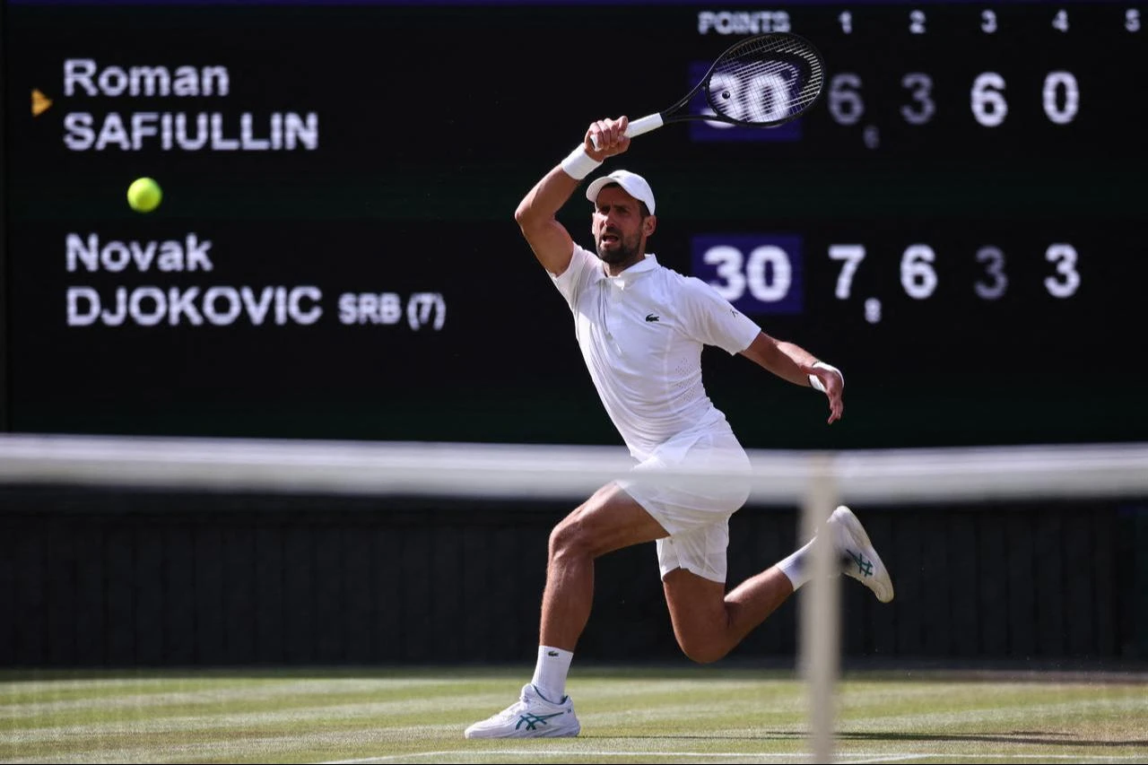 Serbia's Novak Djokovic returns to Russia's Roman Safiullin during their men's singles round of 16 tennis match at The All England Lawn Tennis and Croquet Club in London, England, July 5, 2026. (AFP Photo)