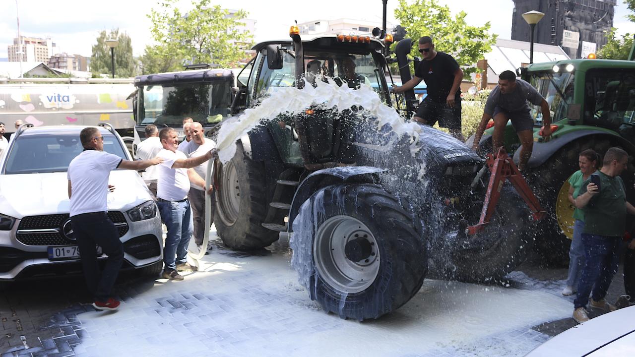 Kosovo dairy farmers dump milk on ground to protest dairy purchase suspension