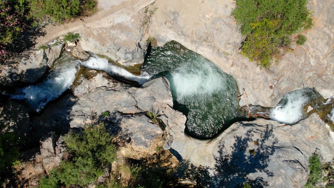 An aerial view shows the Tabak Deresi canyon and its cascading rock pools in Salihli, a rare natural landscape facing pressure from rising visitor numbers. (IHA Photo)