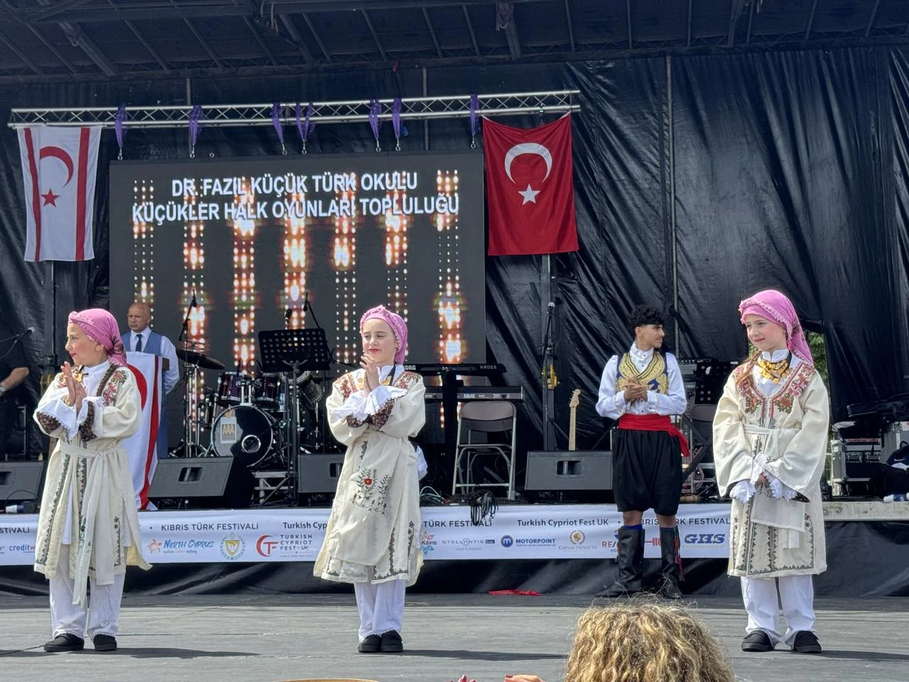Children perform traditional Turkish Cypriot folk dances during the 9th Turkish Cypriot Culture Festival at Donkey Lane in London, United Kingdom. (AA Photo)