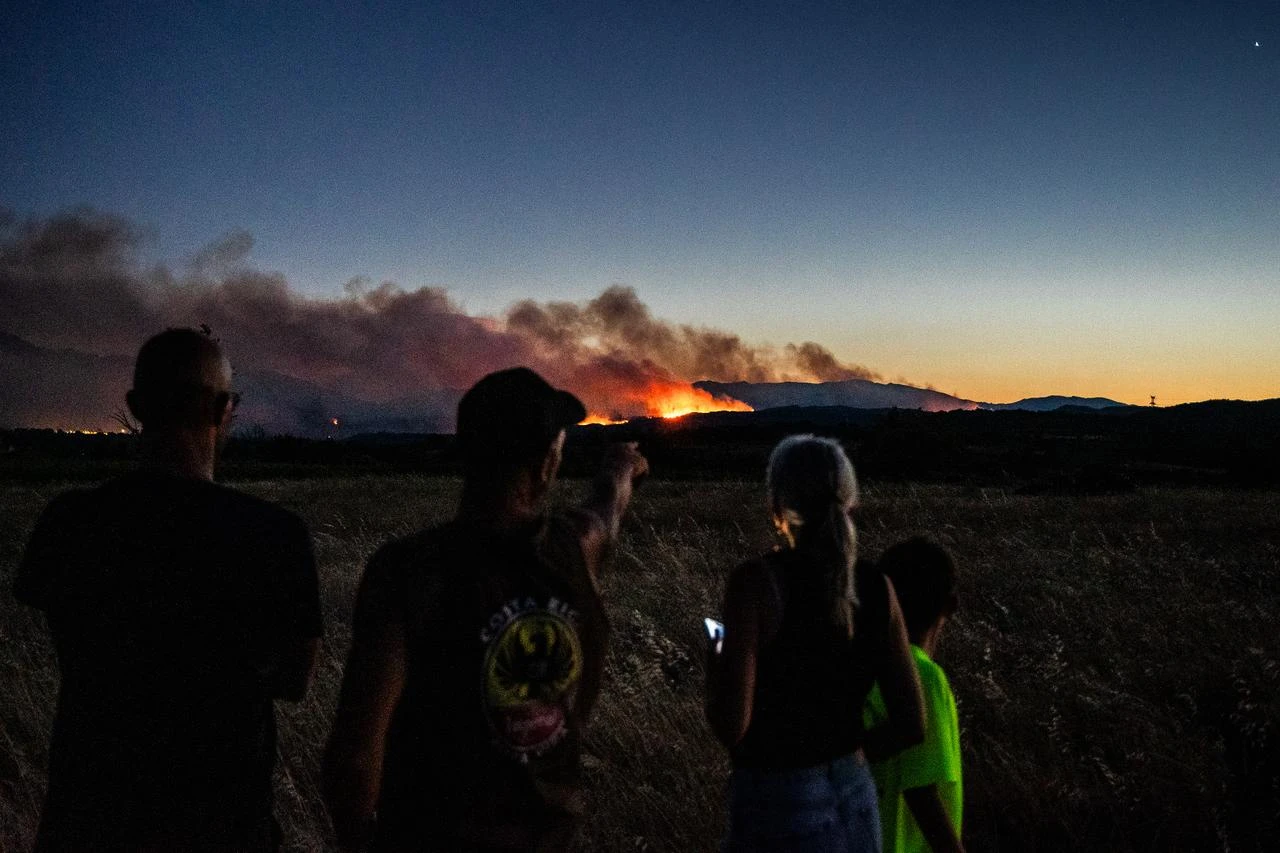 Mass evacuations ordered as raging wildfires devastate Southern Europe