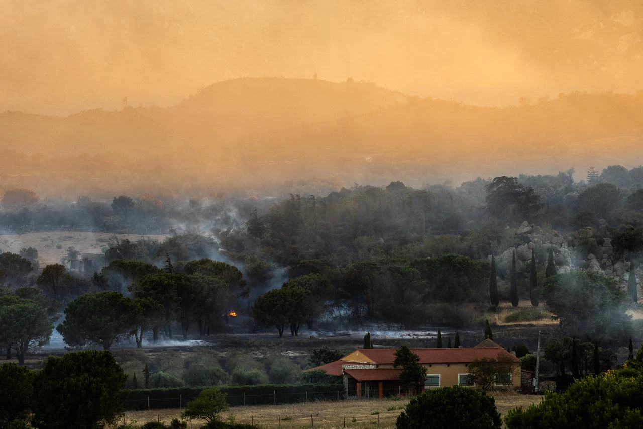 Land smouldering after wildfire passed through on the outskirts of Montalba-le-Chateau, in the Pyrenees-Orientales department, southern France on July 5, 2026. (AFP Photo)