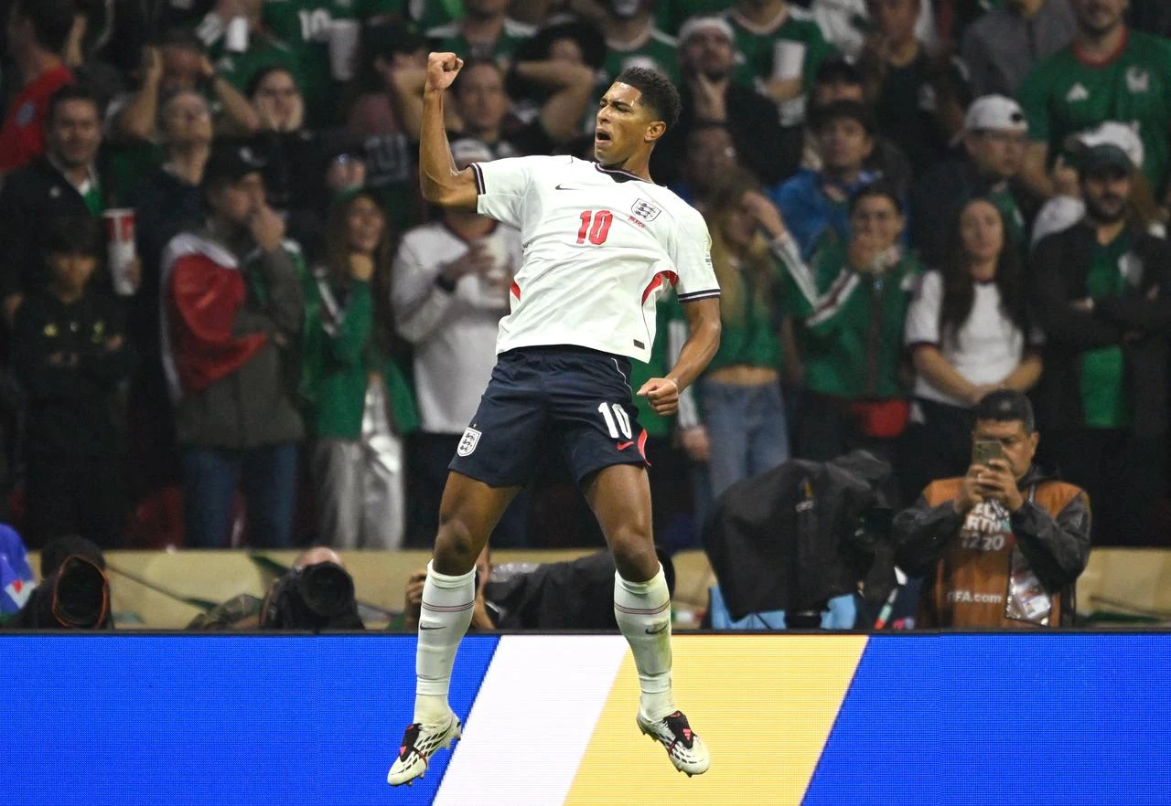 England's midfielder #10 Jude Bellingham celebrates scoring his team's first goal during the 2026 World Cup round of 16 football match between Mexico and England at the Mexico City Stadium in Mexico City, July 5, 2026. (AFP Photo)