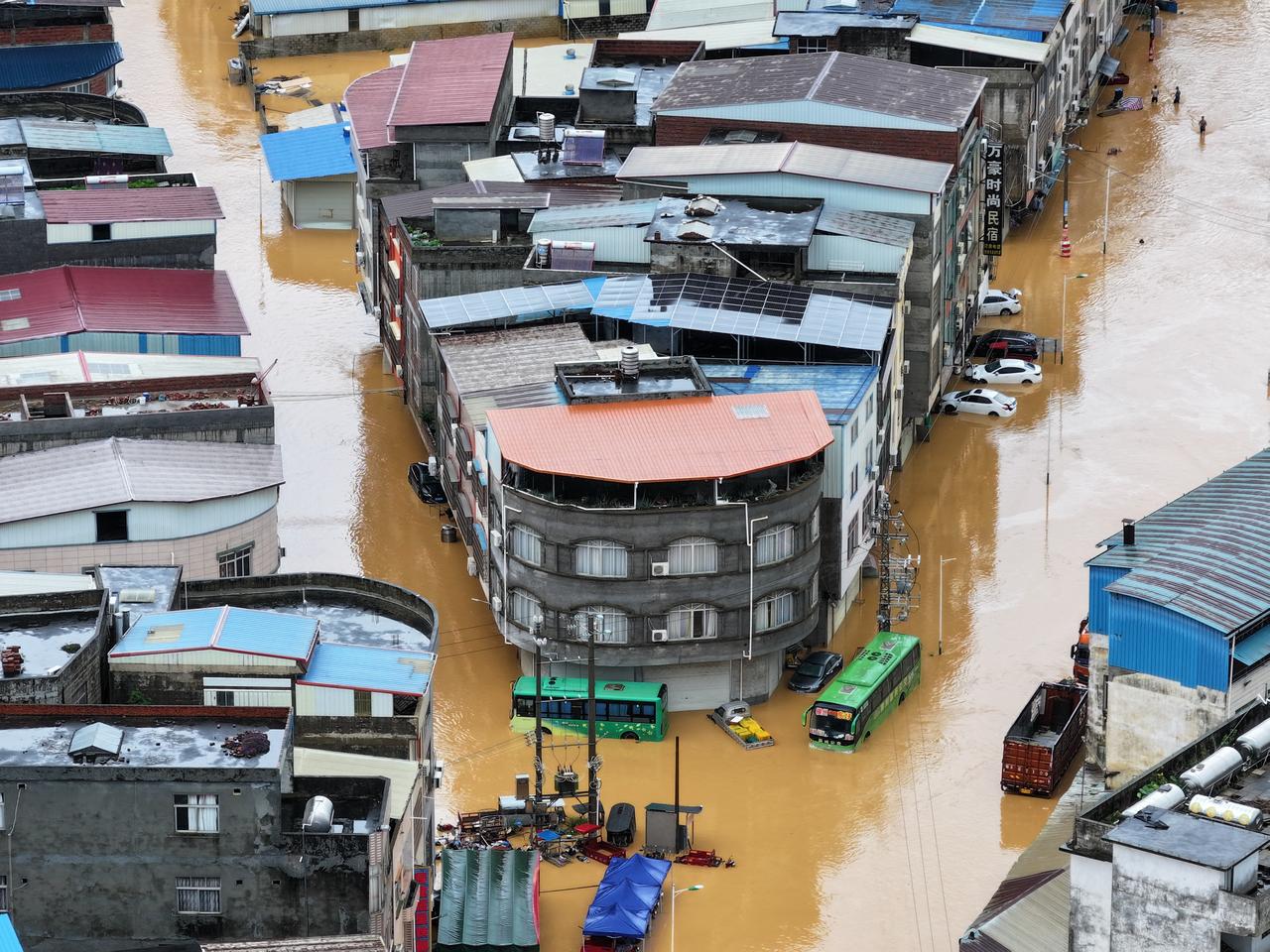 An aerial view shows flooding in Pingshan village at Xiaoyi town in Hengzhou, China's southern Guangxi region on July 6, 2026. (AFP Photo)