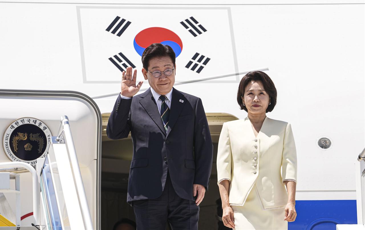 South Korean President Lee Jae Myung and his wife Kim Hea Kyung arrive at Esenboga Airport to attend the 36th NATO Heads of State and Government Summit, in Ankara, Türkiye, July 7, 2026. (AA Photo)