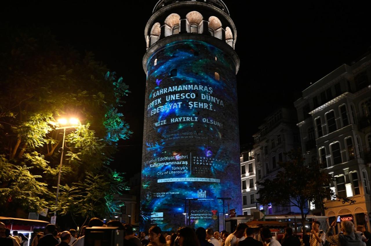 Galata Tower is illuminated with a message marking Kahramanmaras' designation as Türkiye's first UNESCO City of Literature. (Photo via Türkiye's Culture and Tourism Ministry)