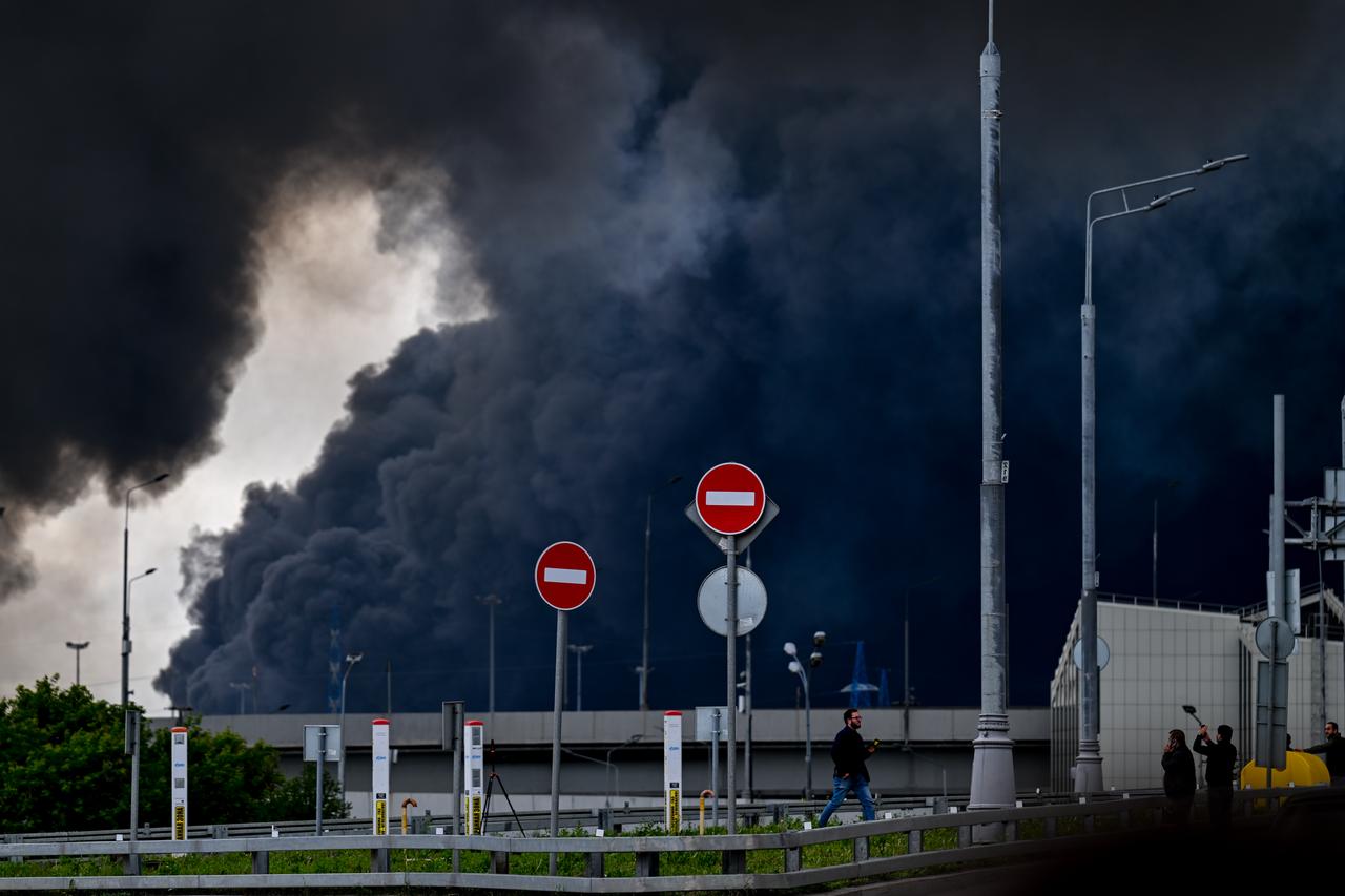 Black smoke rises from the refinery where a fire broke out following a strike as firefighting efforts continue in Moscow, Russia, June 18, 2026. (AA Photo)