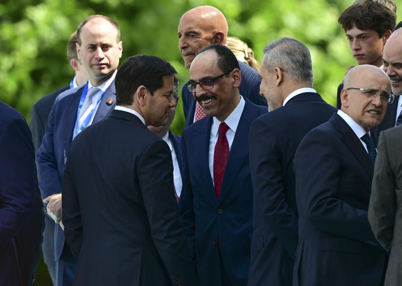 Turkish Foreign Minister Hakan Fidan (2nd R), Turkish National Intelligence Organization (MIT) chief Ibrahim Kalin (2nd L) and U.S. Secretary of State Marco Rubio (L) speak before the official welcoming ceremony in Ankara, July 7, 2026. (AA Photo)