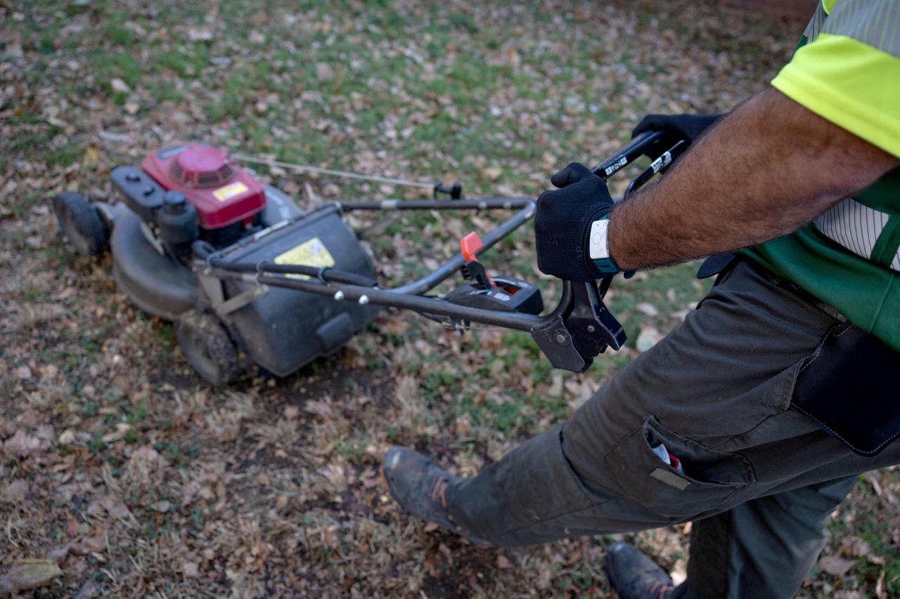 Gardener works with a wristband containing a sensor that detects body temperature in Barcelona on July 6, 2026. (AFP Photo)