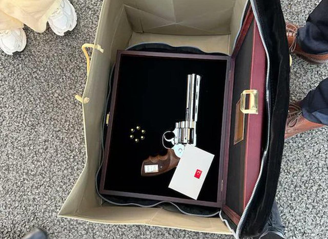 A custom-engraved Turkish-made Sarsilmaz SR 38 revolver with ammunition, reportedly presented as a farewell gift to NATO summit participants, is seen in a presentation case in Ankara, Türkiye, July 2026. (Photo via X/@visegrad24)