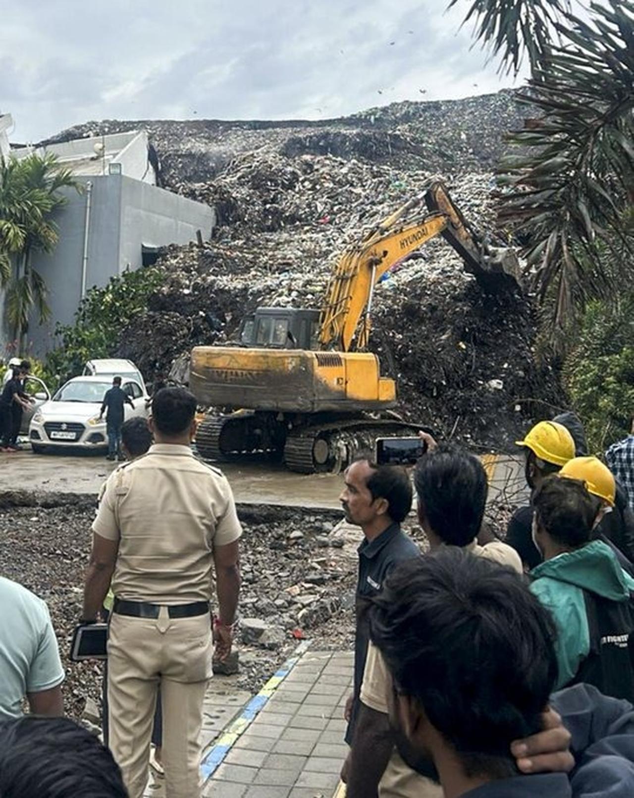 Search-and-rescue teams are continuing efforts to locate and rescue those still trapped. (Photo via X/@PTI_News)